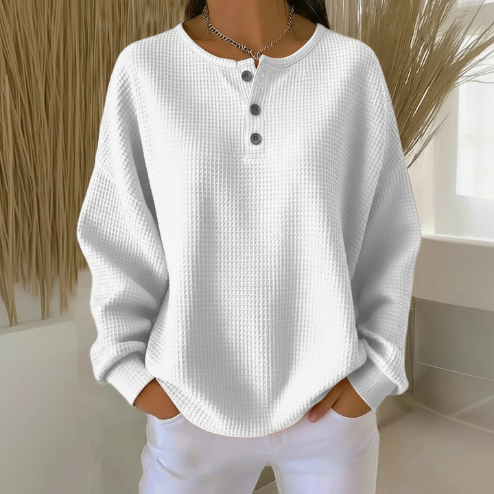 Textured waffle knit women's top, long sleeve with stylish button-front and relaxed drop shoulder design.