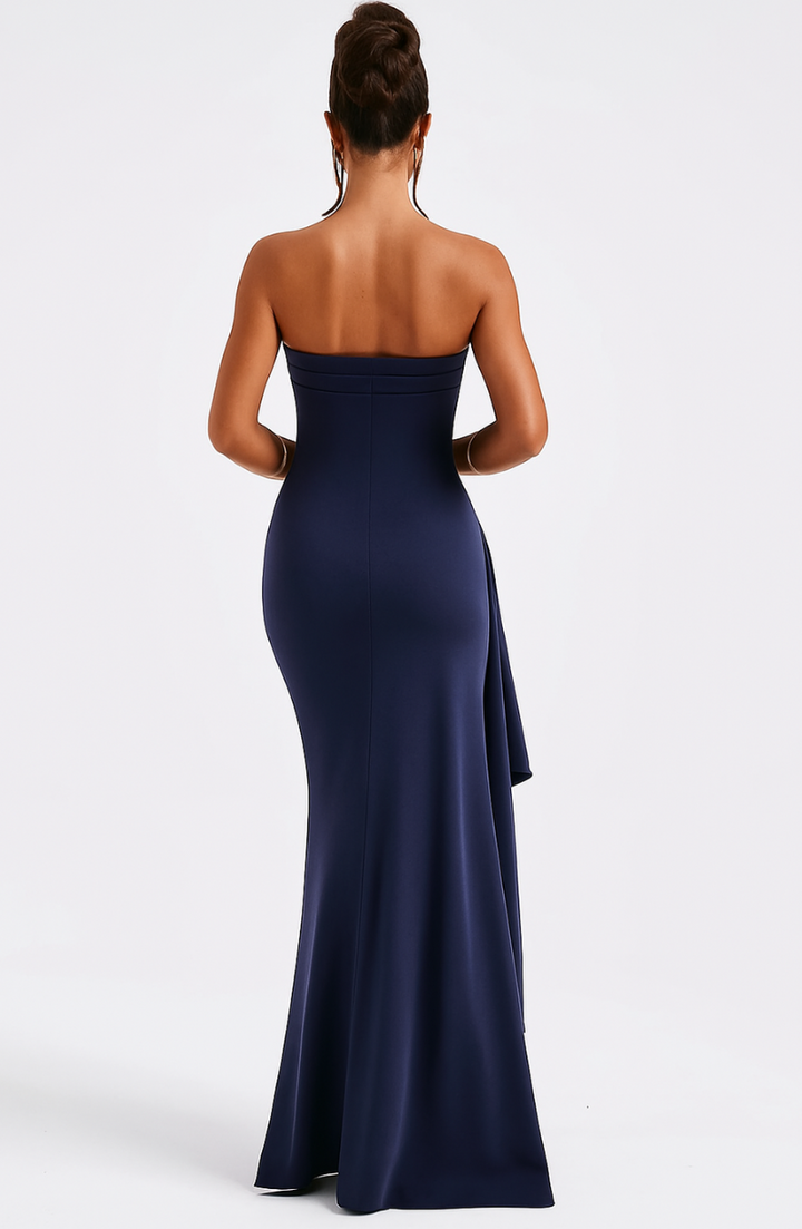 Sophisticated women's black off-shoulder maxi dress with a twisted detail. Ideal for special occasions.