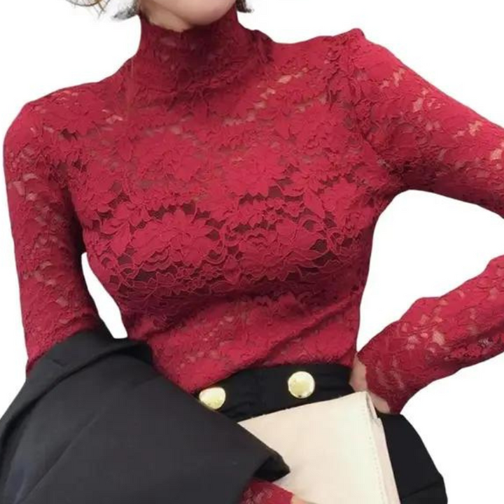 White women's elegant lace blouse with a flattering fitted short sleeve design. Versatile fashion top.