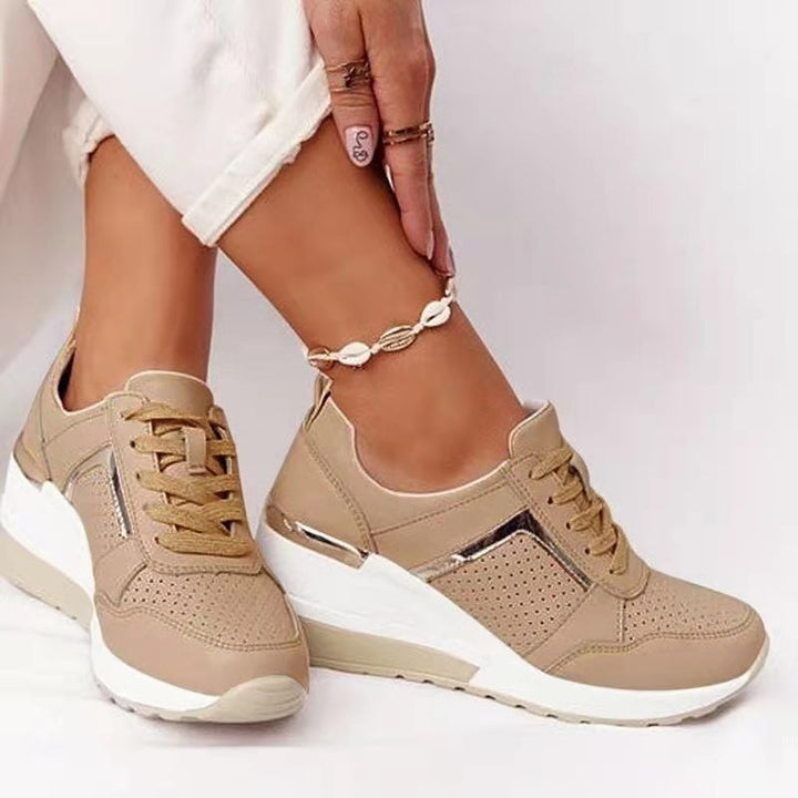 Women's orthopedic sneakers promoting foot health, offering comfort & support for active everyday wear.