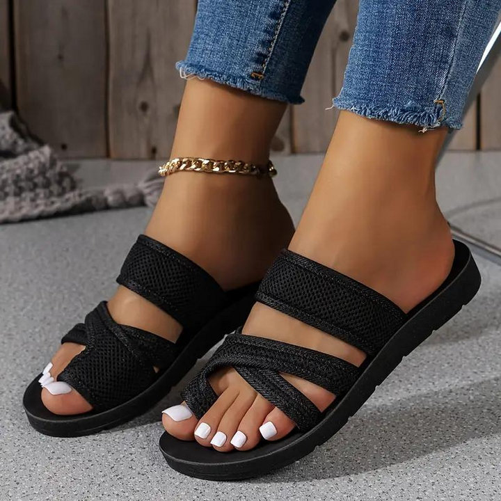 Lightweight women's slip-on slides, ideal for casual summer comfort and easy wear.