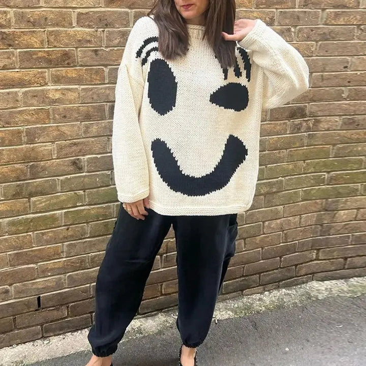 Trendy women's oversized smiley face long sleeve cardigan sweater. Cozy knitwear for casual fall & winter wear.