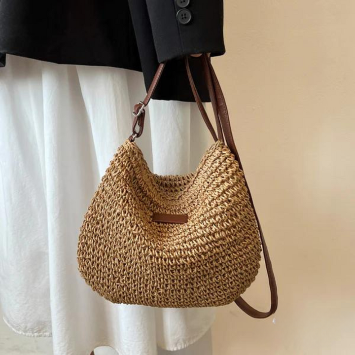 Stylish beige woven women's crossbody bag with a textured design, a versatile fashion accessory.