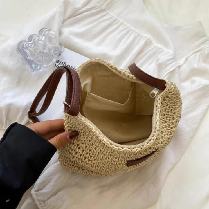 Textured brown woven shoulder bag for women, a stylish crossbody accessory with an adjustable strap.