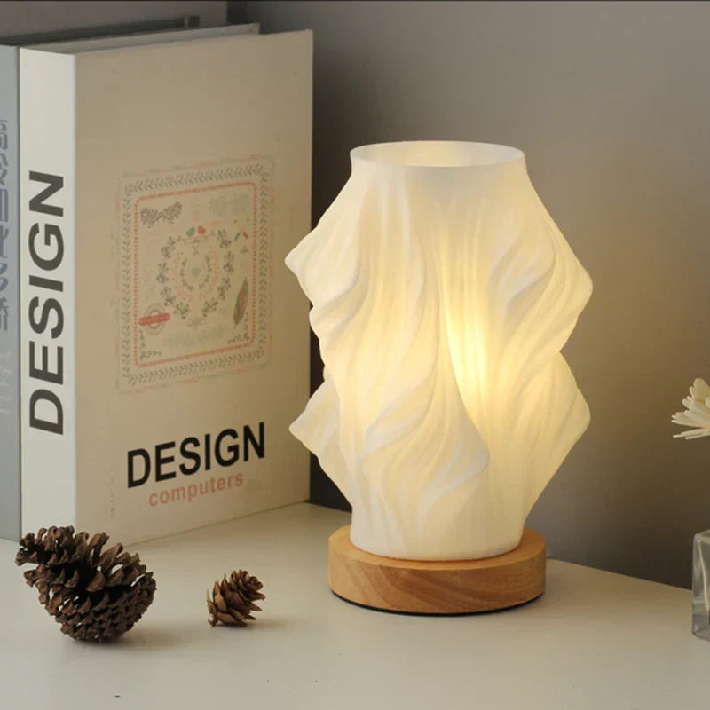 Wave design table lamp, dimmable LED, provides natural light and modern elegance.