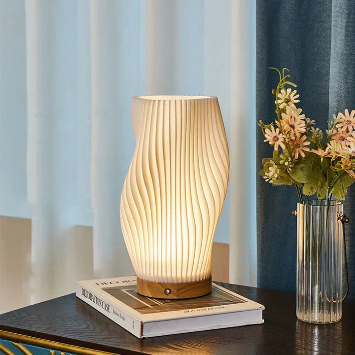 USB powered Wavecrest table lamp, sculpted modern design, perfect for accent lighting.
