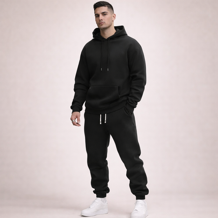 Comfortable unisex solid grey tracksuit. Versatile loungewear or casual wear, offering breathable everyday style.