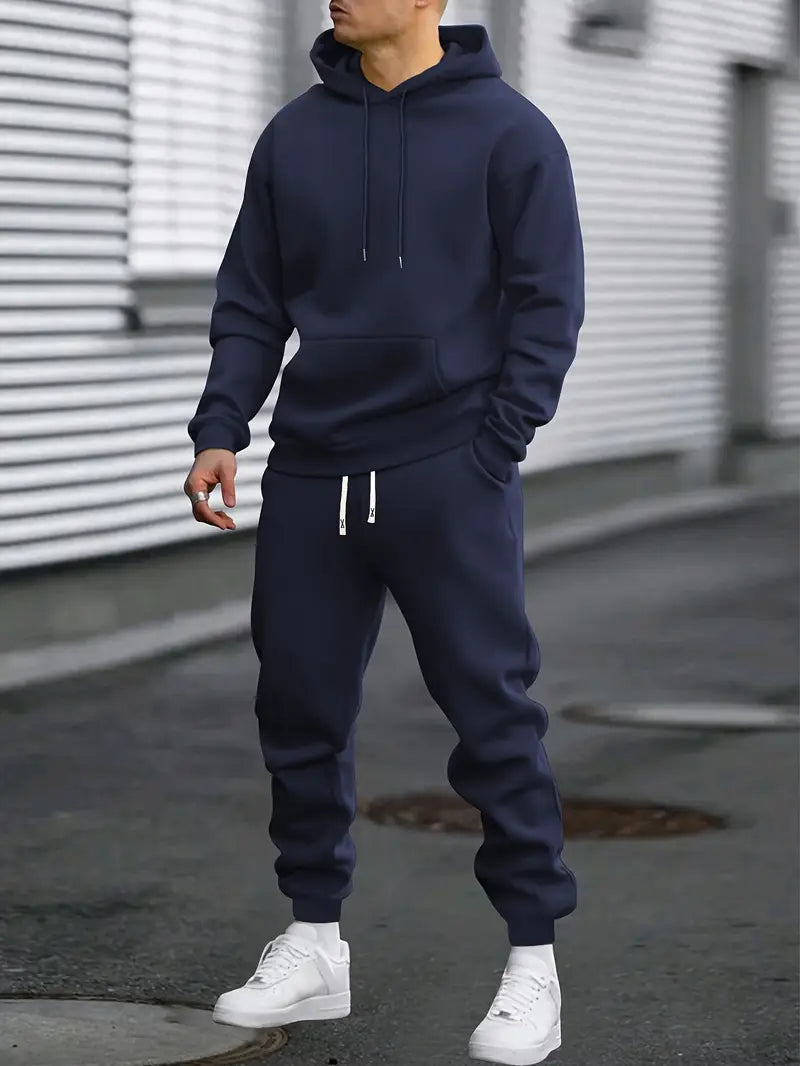 Plain solid charcoal grey unisex tracksuit. Breathable material for maximum everyday comfort and casual style.
