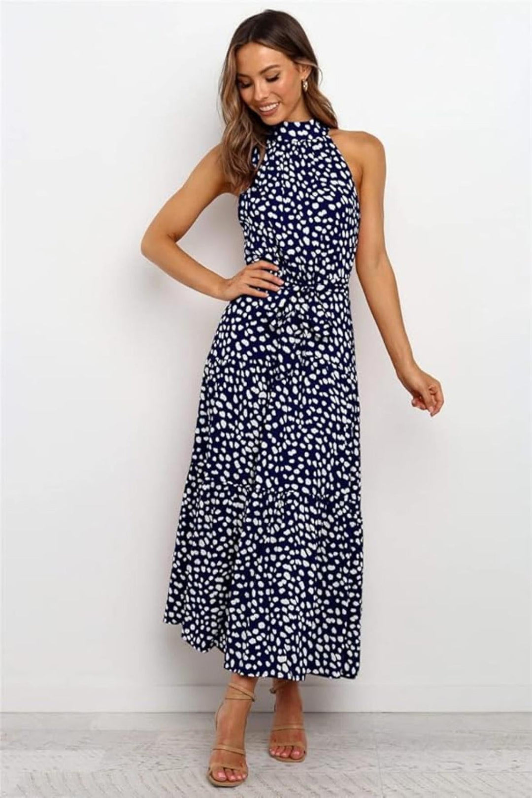Elegant white polka dot halter midi dress, a charming women's summer casual or day dress.