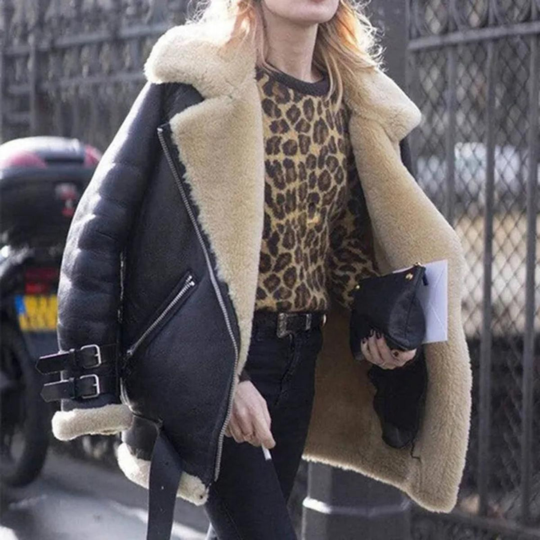 Everyday women's warm winter jacket, featuring a stylish belt & practical front pockets.