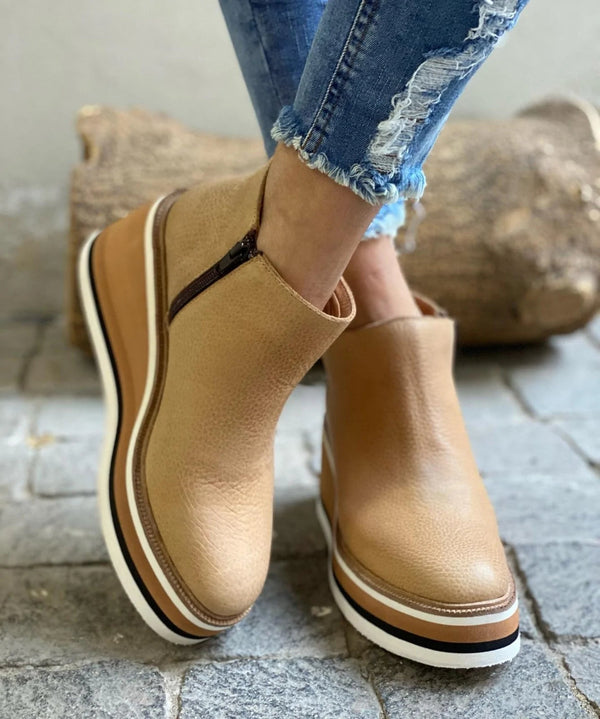 Modern women's platform ankle boots, blending style & ultimate comfort with a practical mid heel.