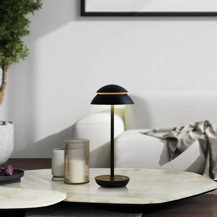 Portable cordless LED lamp with sleek Nordic design. Ideal desk lamp or accent light.