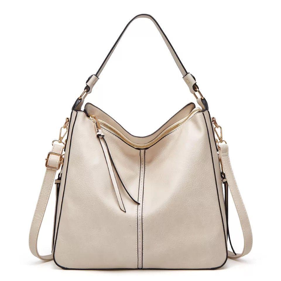 Luxury women's spacious leather handbag, perfect for everyday style.