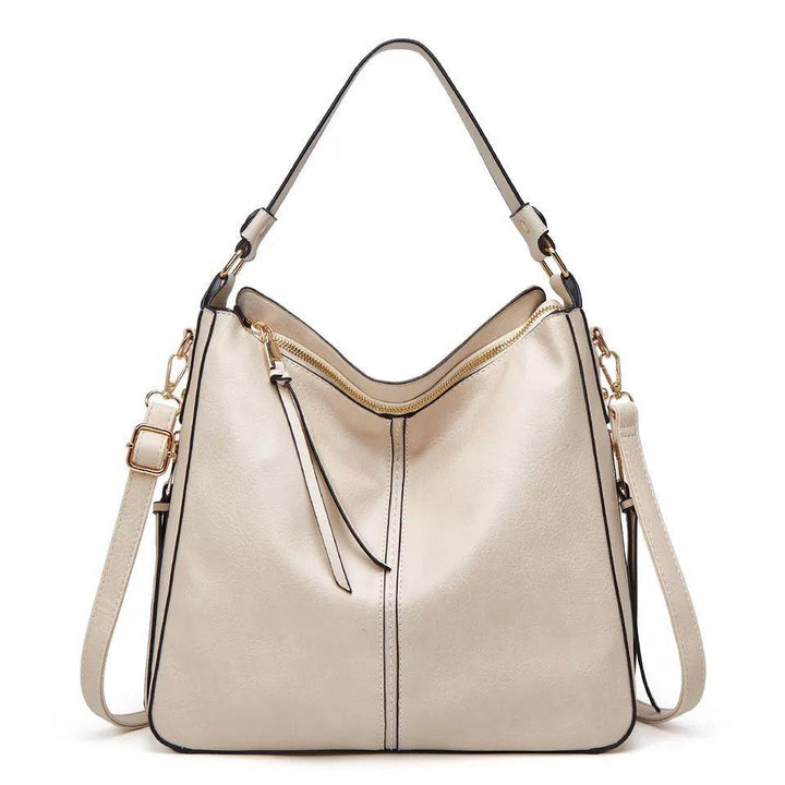 Luxury women's spacious leather handbag, perfect for everyday style.