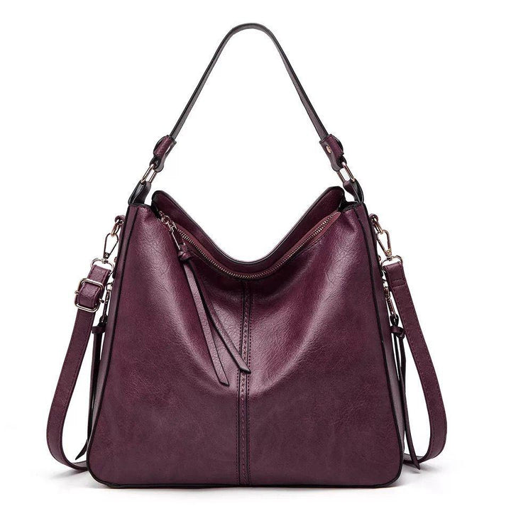 Chic women's shoulder bag, luxurious brown leather for a fashionable look.