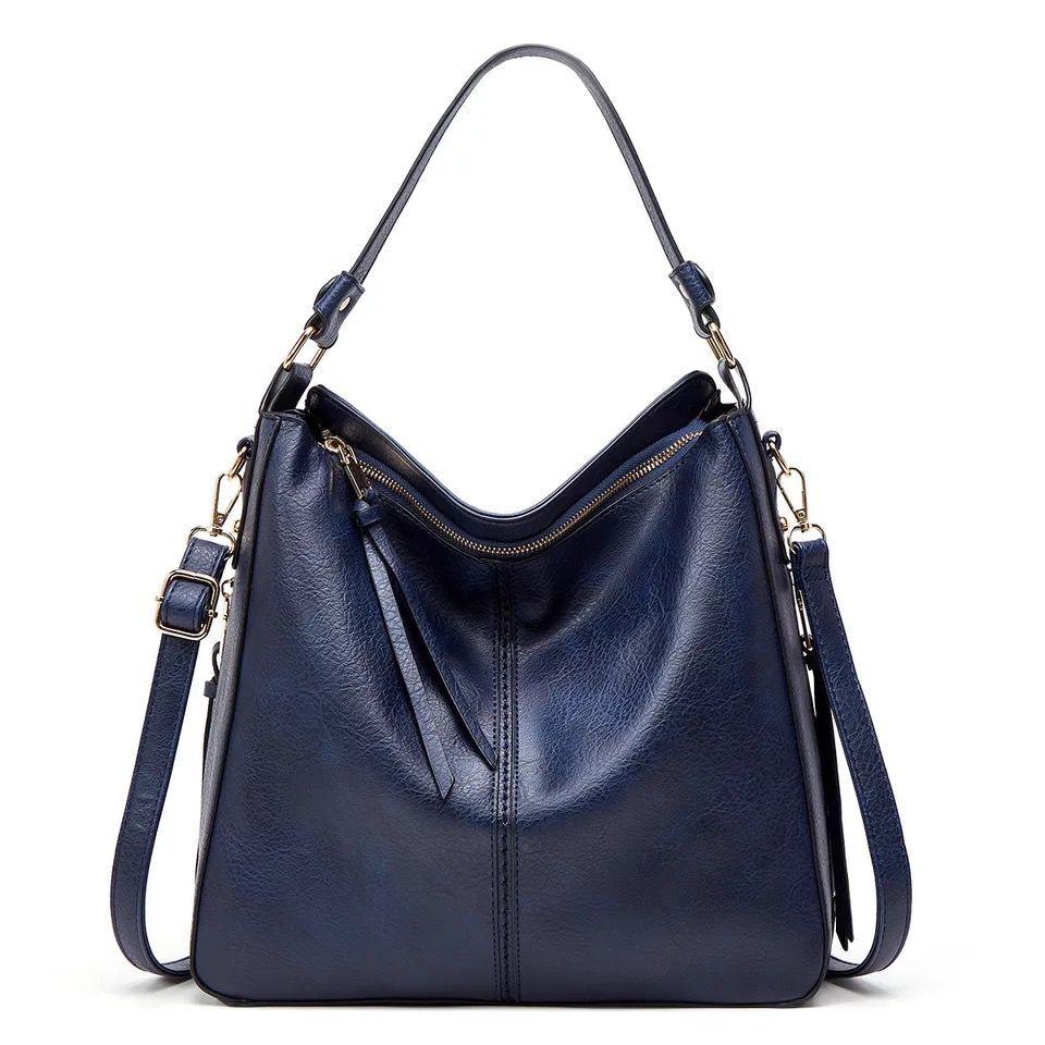 Women's fashion shoulder bag, black leather, versatile & elegant.