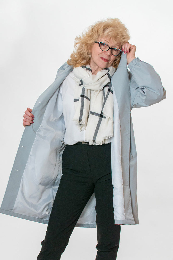 Women's weatherproof oversized hooded windbreaker. A versatile, packable jacket for all seasons.