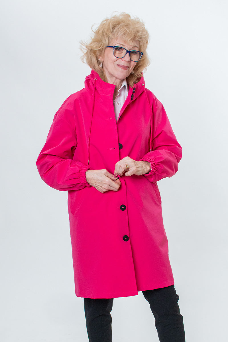 Comfortable oversized women's hooded windbreaker. Water-resistant, lightweight, a perfect layering piece.