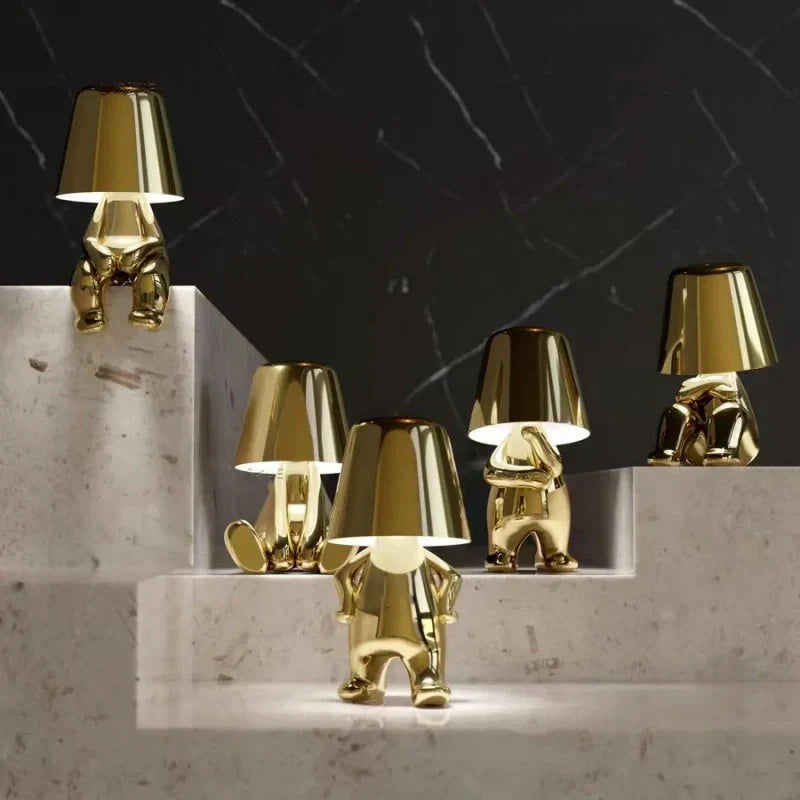 Artistic figurine LED lamp, dimmable, cordless & portable. Perfect for modern home decor.