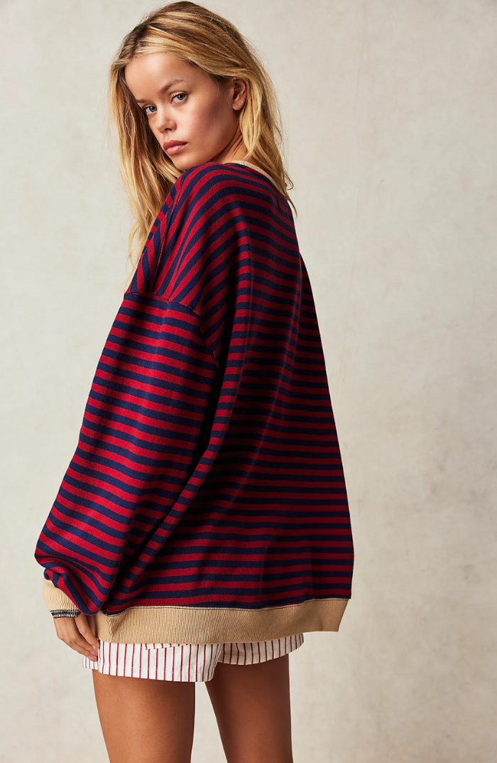 Versatile women's oversized striped sweater for comfortable, casual, everyday fashion.