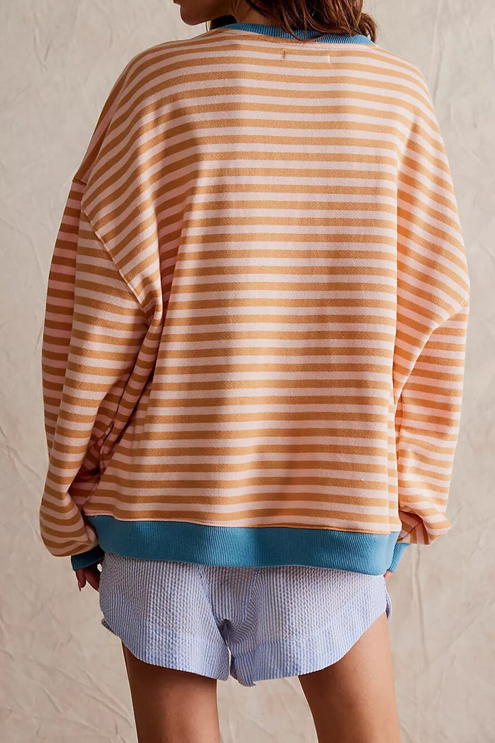 Casual women's striped oversized sweater, soft and comfortable for daily wear.