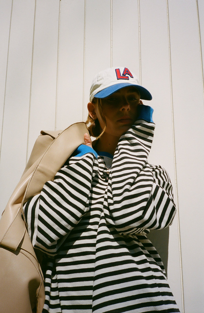 Layering-friendly women's striped oversized sweater, super cozy for relaxed fashion.