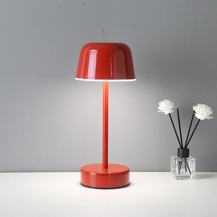 Elegant cordless LED table lamp, modern design, dimmable for adjustable interior home lighting.