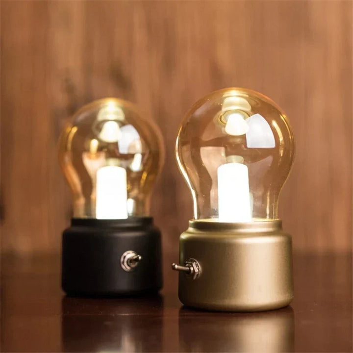 Portable retro LED table lamp; USB rechargeable, providing a warm, inviting glow for any room.