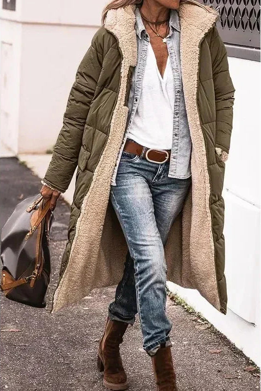 Women's reversible winter jacket, offering two stylish looks & warm comfort for cold weather.
