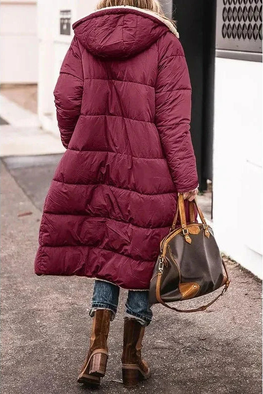 Women's reversible winter outerwear, combining warmth, style, and versatility.