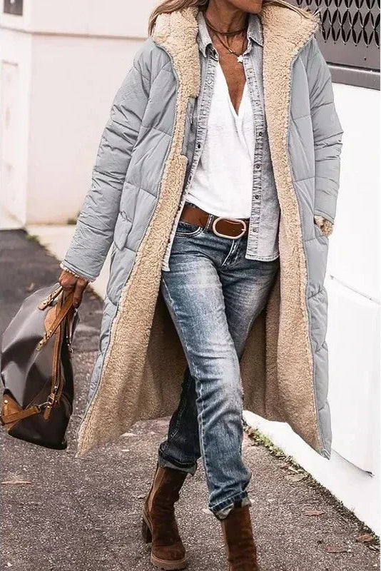 Warm & versatile women's reversible jacket, ideal for layering and changing winter styles.