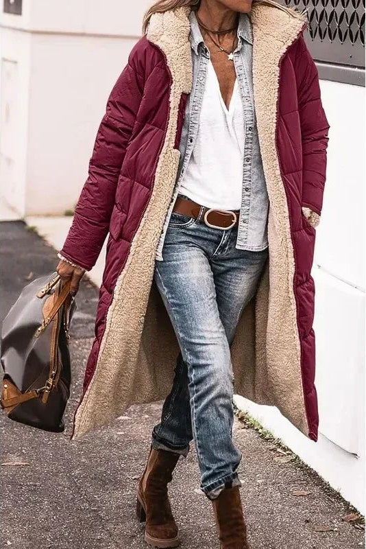Warm women's reversible coat, essential for comfortable layering & seasonal style.