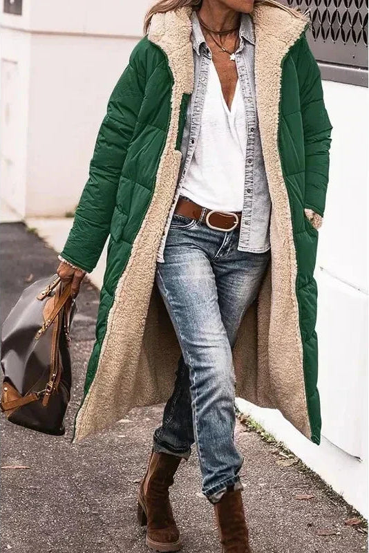 Stylish reversible women's coat, providing warmth and two fashionable options.