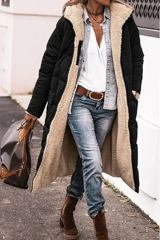 Chic women's reversible winter jacket, ensuring warmth and a sophisticated look.