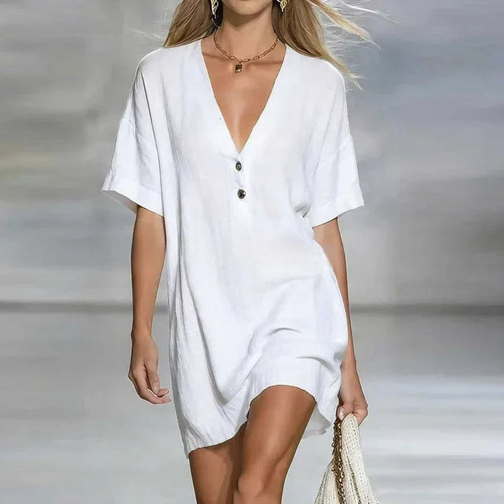 Stylish women's V-neck short sleeve mini dress. Breezy & comfortable for any casual occasion.