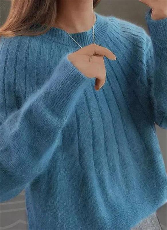 Women's cozy ribbed knit sweater in a modern fit, perfect for stylish everyday wear and versatile layering.