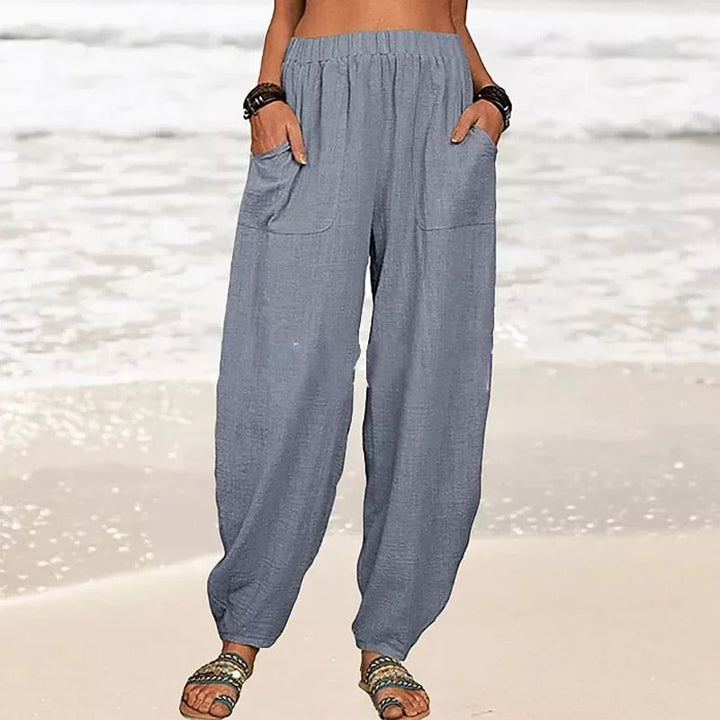 Comfortable wide leg beach pants for women. Relaxed fit summer trousers with pockets for vacation.
