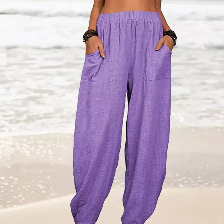 Versatile women's casual pants. Relaxed fit summer trousers with pockets, great for beach or resort.