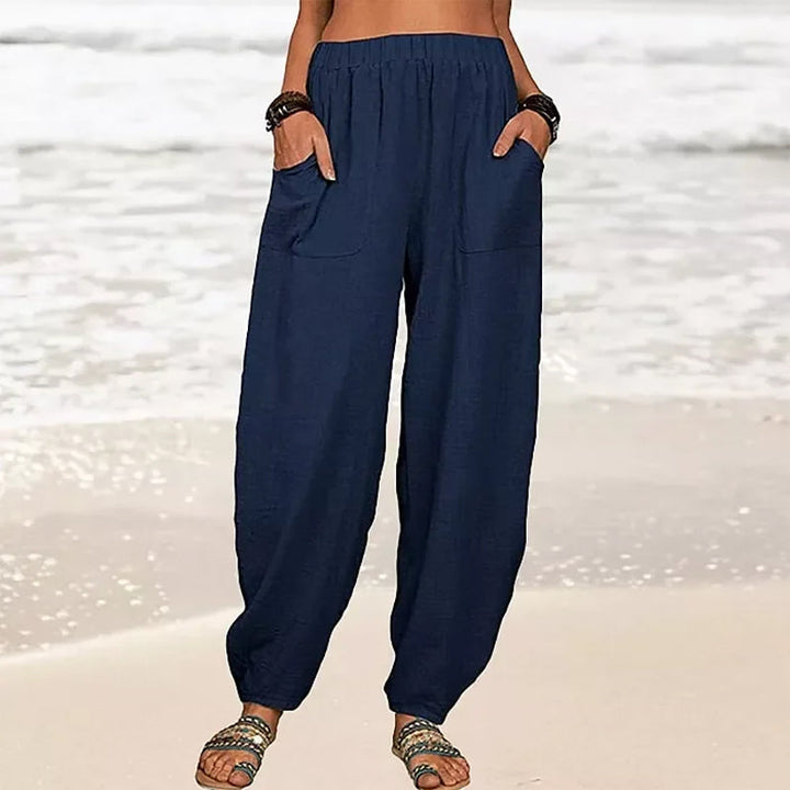 Women's relaxed fit summer beach pants with handy pockets. Comfortable wide leg casual trousers.