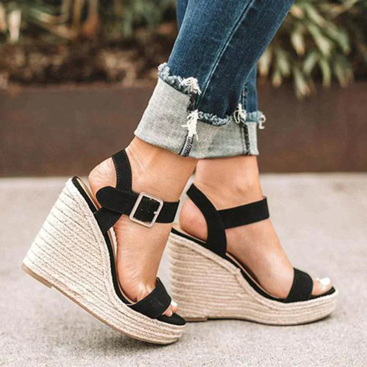 Elegant women's open-toe espadrille platform sandals with woven detail, perfect casual summer footwear.