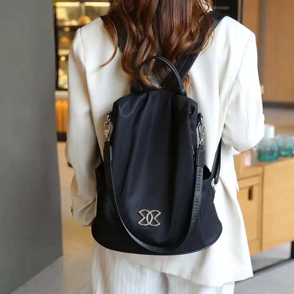 Sleek anti-theft shoulder bag, perfect for daily use, secure storage for laptops & essentials. Unisex modern backpack.