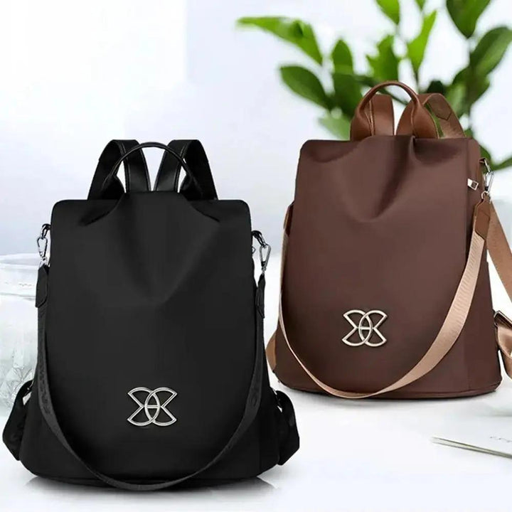 Modern anti-theft backpack in black, showcasing hidden zippers & secure pockets. Ideal for urban adventurers & daily safety.