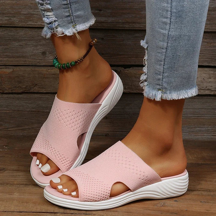 Supportive women's summer sandals providing orthopedic arch support & comfort for active daily wear.