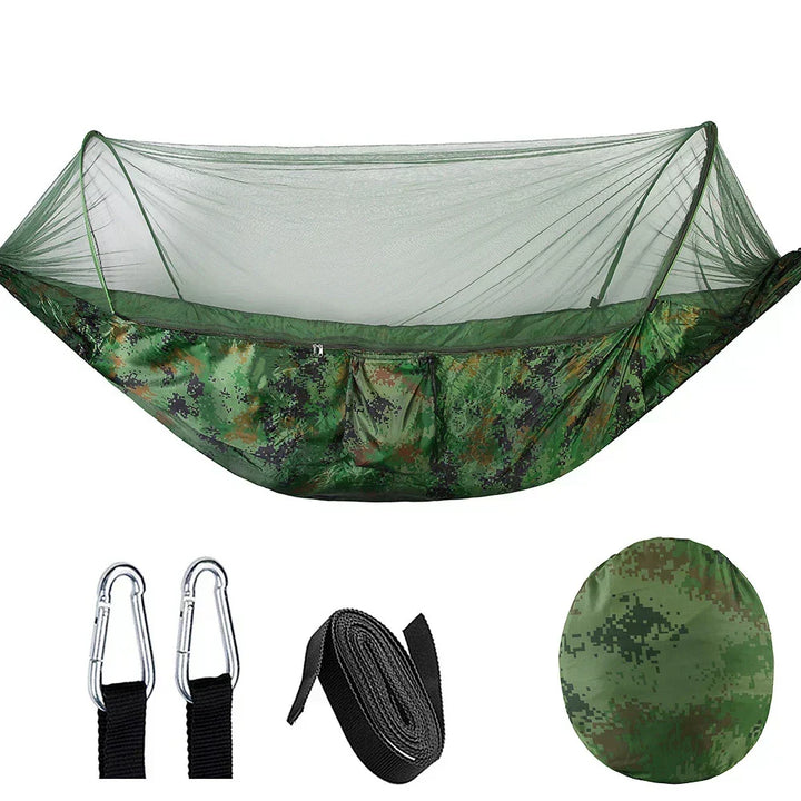 Durable parachute hammock for camping & hiking, providing bug-free outdoor relaxation with its integrated mosquito net.