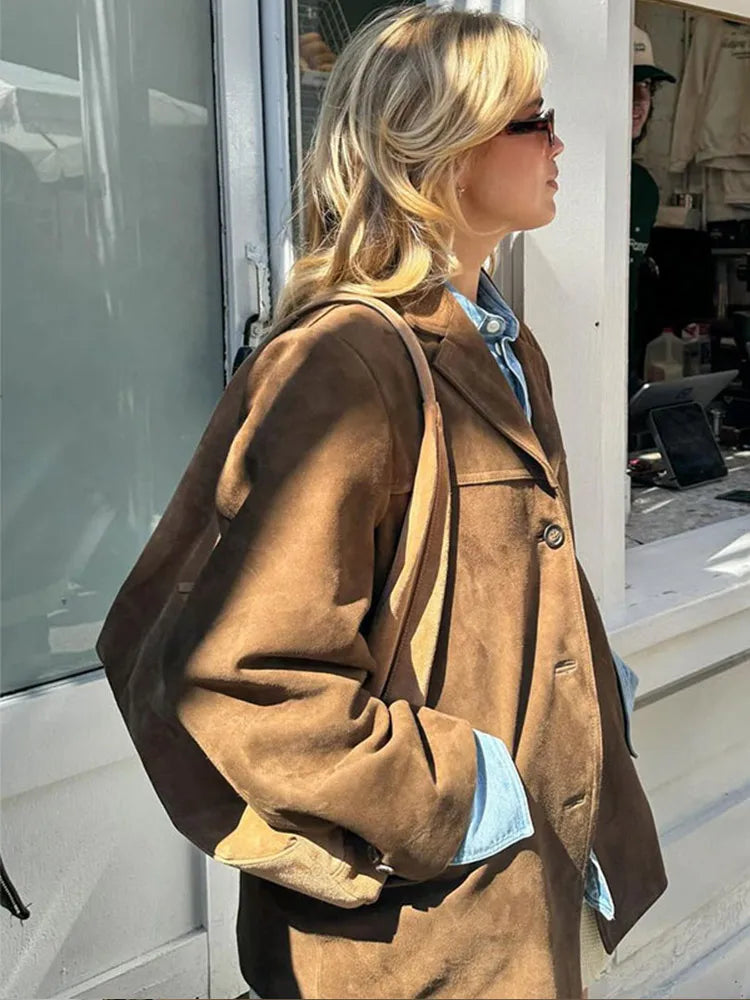 Elegant women's regular fit brown jacket, a classic fashion staple for any season.