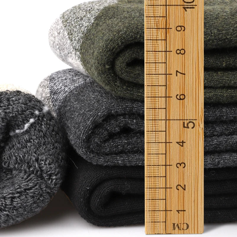 Soft men's thermal winter socks, mid-length design for superior warmth. 3-pack cold weather footwear.