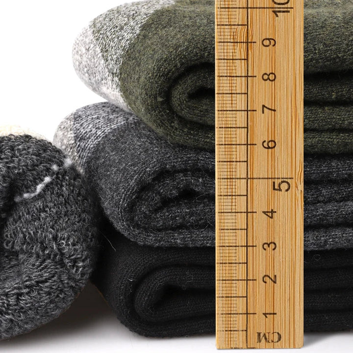 Soft men's thermal winter socks, mid-length design for superior warmth. 3-pack cold weather footwear.