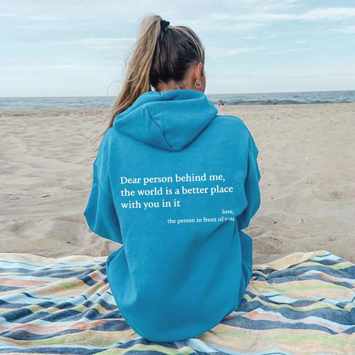 Front view of women's 'Dear Person Behind Me' slogan hoodie. Graphic pullover, comfortable casual positive message top.