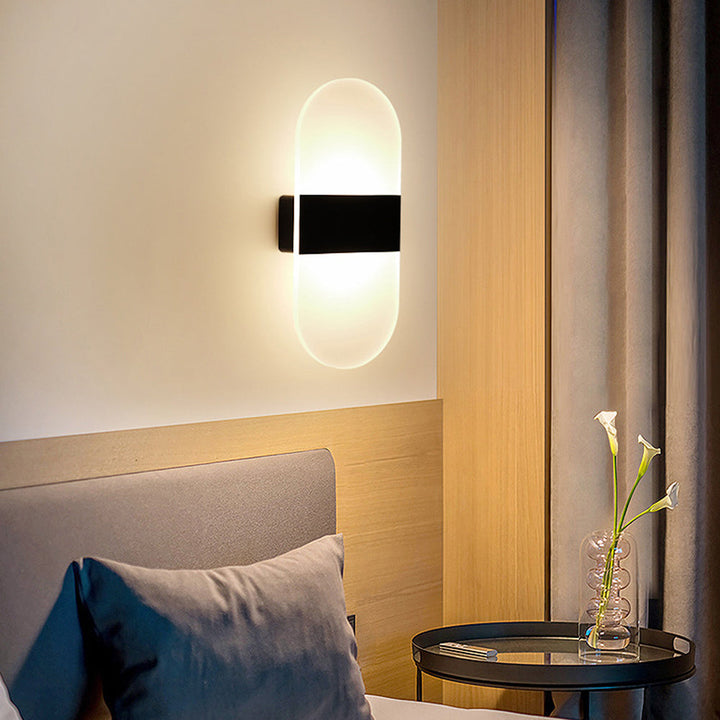 Modern LED wall sconce with smart motion sensor for indoor lighting and home decor.