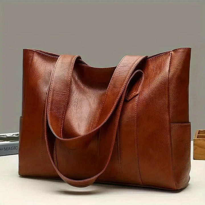 Timeless women's genuine leather crossbody bag. Elegant, durable & versatile, a perfect fashion accessory.